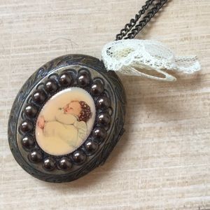 Sleeping angel locket necklace